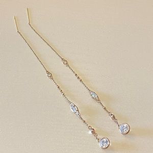 Kendra Scott Monica shoulder duster earrings in Gold